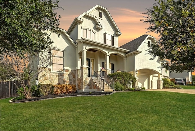 view of front of home with a lawn