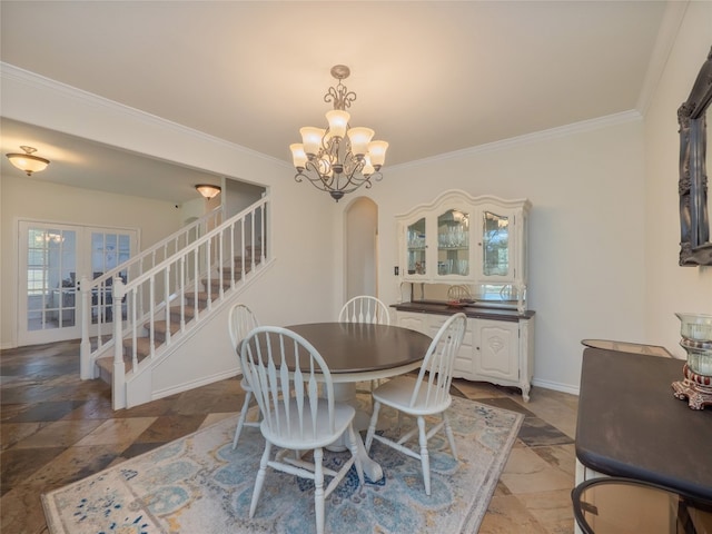 dining area with french doors, an inviting chandelier, and ornamental molding