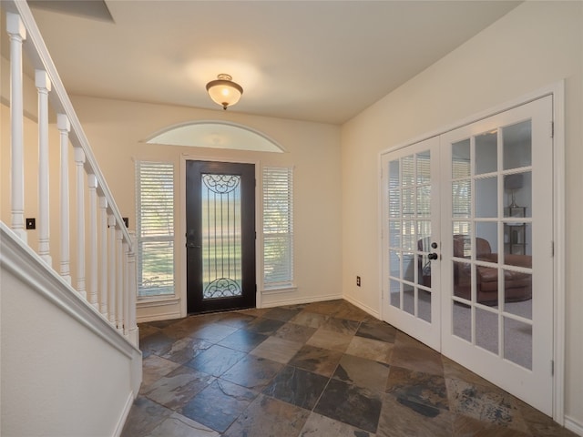 entrance foyer featuring french doors