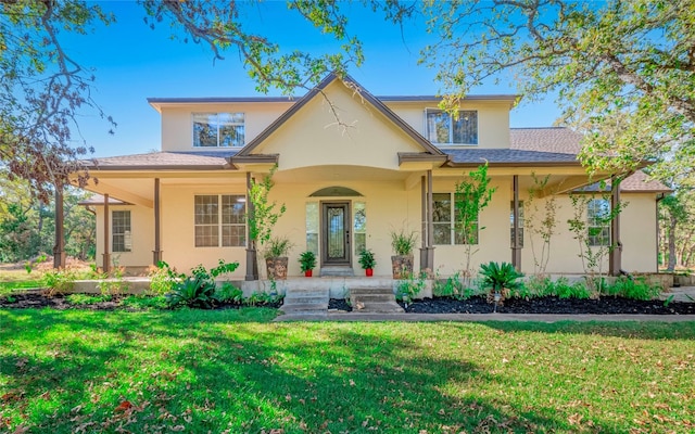 view of front facade featuring a front yard