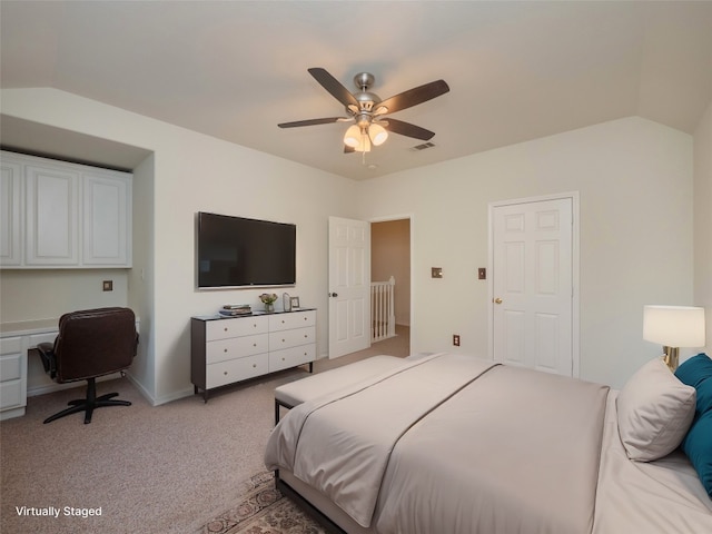 carpeted bedroom featuring ceiling fan and lofted ceiling