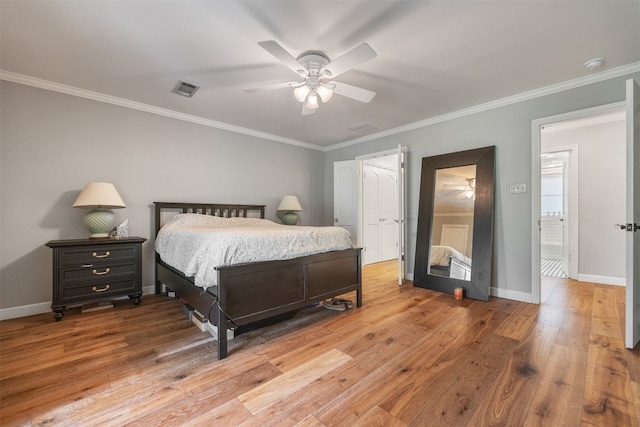 bedroom with ceiling fan, light hardwood / wood-style flooring, and ornamental molding