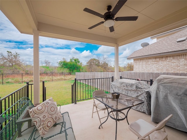 view of patio / terrace with ceiling fan and a grill