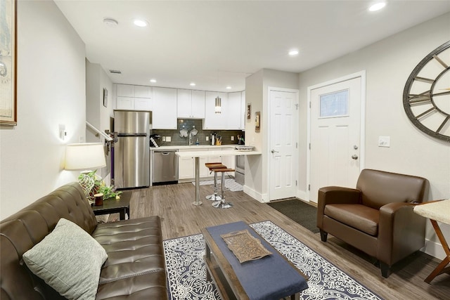 living room with hardwood / wood-style floors