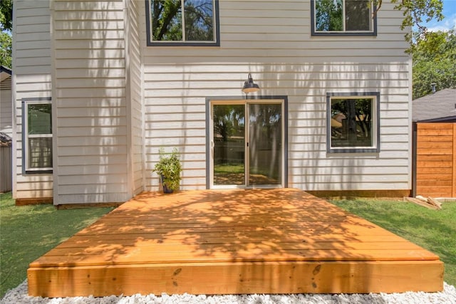 exterior space featuring a yard and a deck