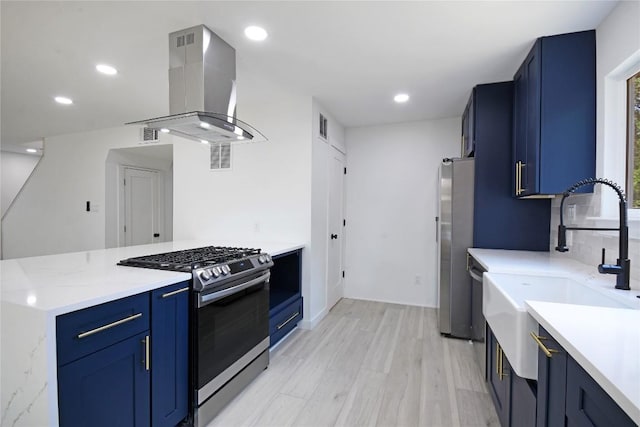 kitchen featuring blue cabinetry, light wood-type flooring, stainless steel appliances, and island exhaust hood