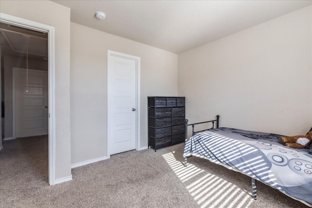 carpeted bedroom with a closet