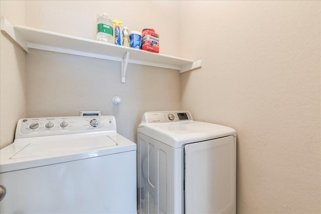 laundry area featuring washing machine and dryer