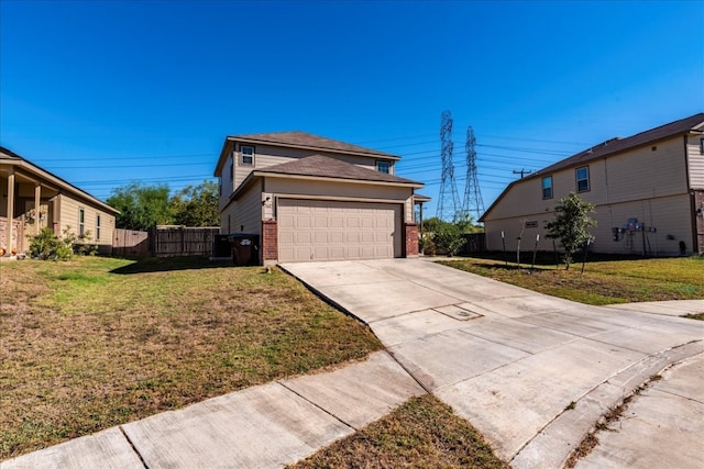 view of front of house featuring a front yard and a garage