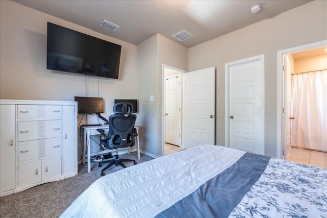 bedroom featuring carpet