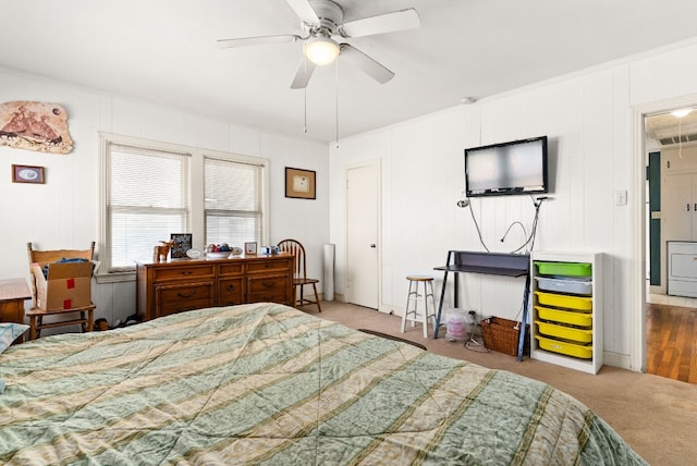 bedroom with ceiling fan and carpet