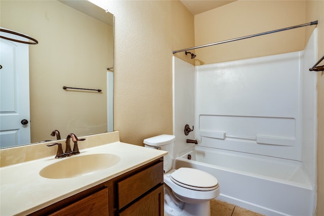 full bathroom with tile patterned floors, shower / washtub combination, vanity, and toilet