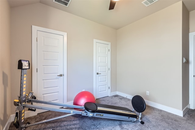 exercise room with carpet floors, vaulted ceiling, and ceiling fan