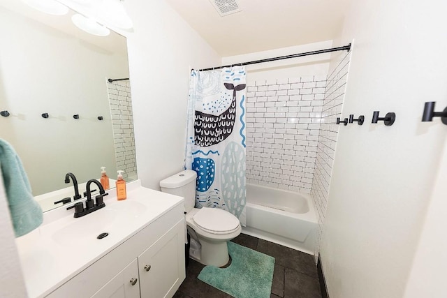 full bathroom with vanity, shower / bath combo, tile patterned floors, and toilet