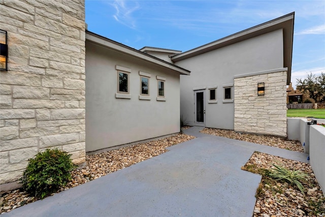 view of home's exterior with a patio area