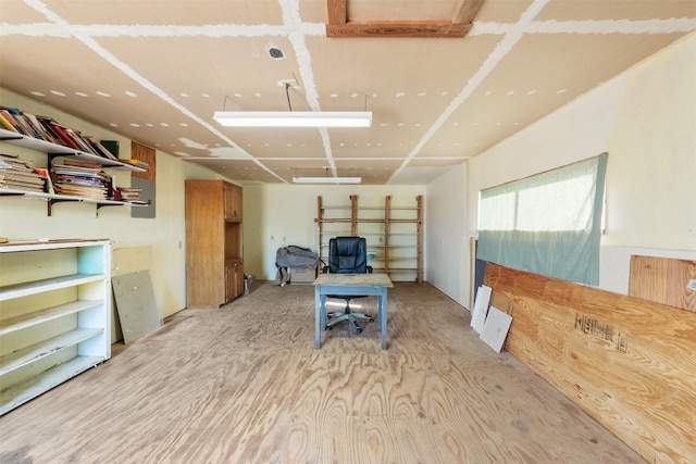 office space with light wood-type flooring