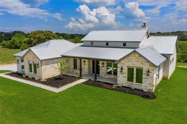 exterior space with a lawn and a porch