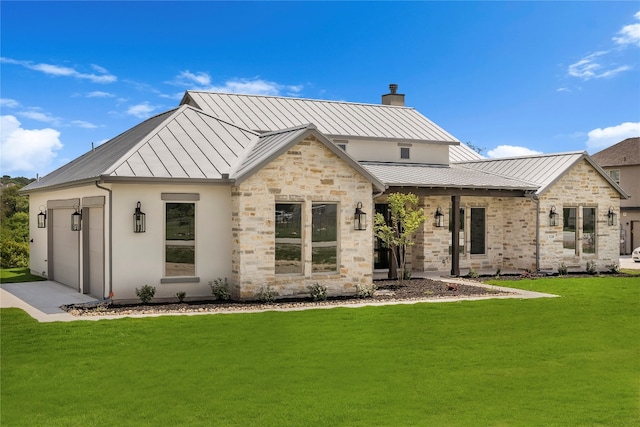 rear view of house featuring a yard