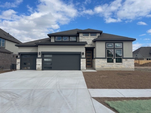 prairie-style home with a garage