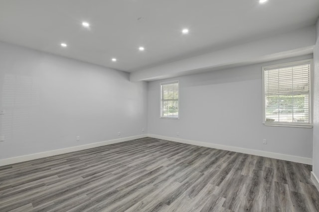 spare room featuring hardwood / wood-style flooring