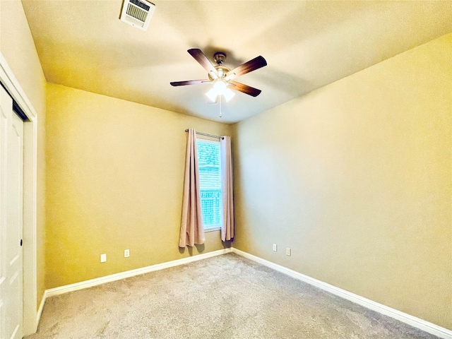 unfurnished bedroom with carpet floors and ceiling fan