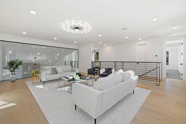 419 Hazeltine Dr, Lakeway, TX 78734 - living room with light wood-type flooring and recessed lighting