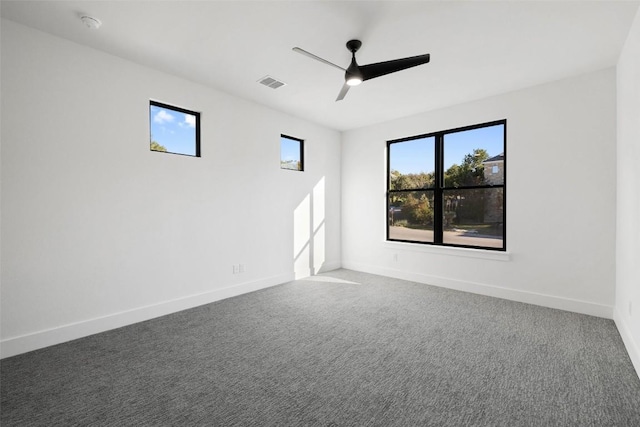 419 Hazeltine Dr, Lakeway, TX 78734 - carpeted empty room featuring healthy amount of natural light, ceiling fan, and a smoke detector