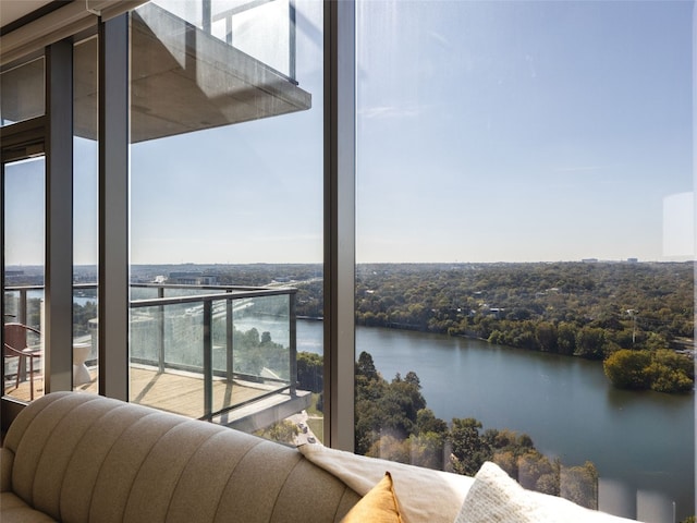 balcony featuring a water view