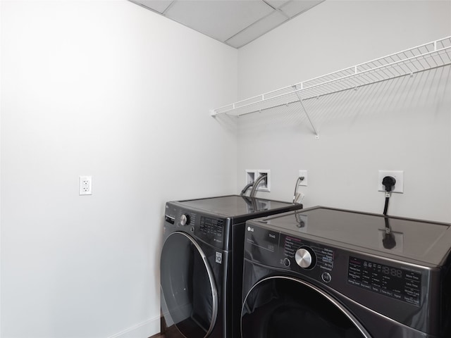 laundry room with washer and clothes dryer