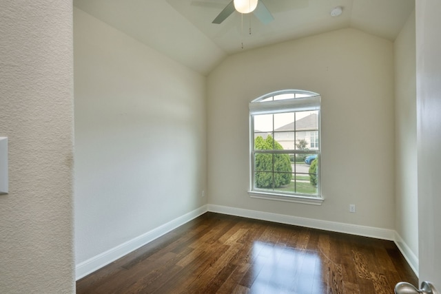 unfurnished room with dark hardwood / wood-style flooring, ceiling fan, and lofted ceiling