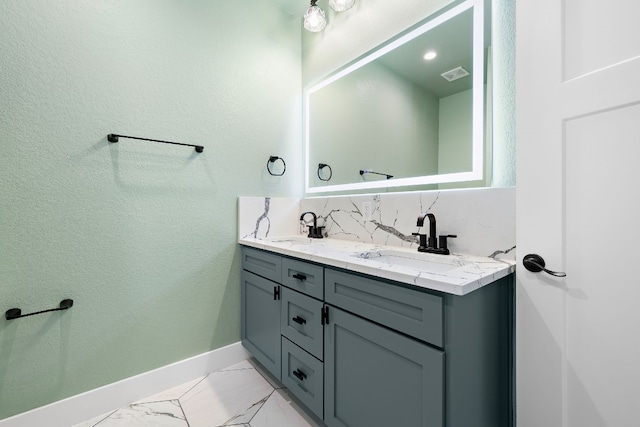 bathroom with decorative backsplash, tile patterned flooring, and vanity