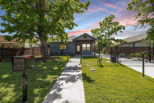 bungalow-style home featuring a yard