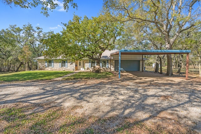 ranch-style home with a front yard and a garage