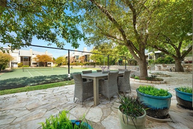 view of patio / terrace featuring tennis court