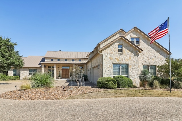 view of front of home featuring a garage