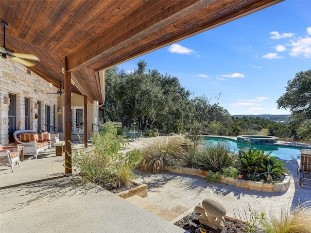 1178 Hidden Creek Dr, Dripping Springs, TX 78620 - view of patio featuring a ceiling fan and a pool with connected hot tub