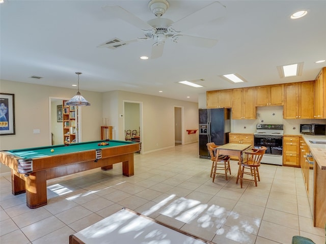 recreation room with ceiling fan, light tile patterned floors, and pool table