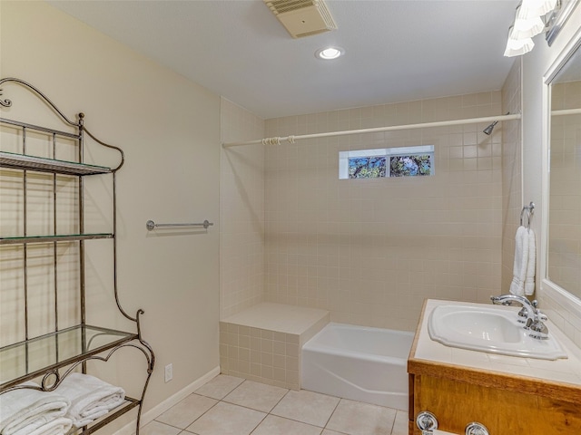 bathroom with tile patterned floors and vanity