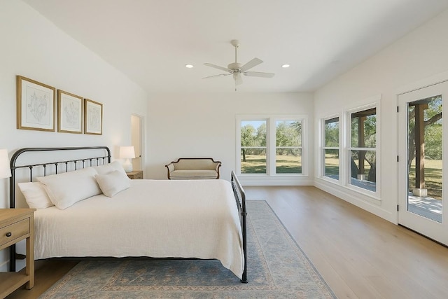 1178 Hidden Creek Dr, Dripping Springs, TX 78620 - bedroom featuring multiple windows, wood finished floors, access to exterior, and recessed lighting
