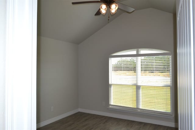 unfurnished room featuring dark hardwood / wood-style floors, ceiling fan, and lofted ceiling