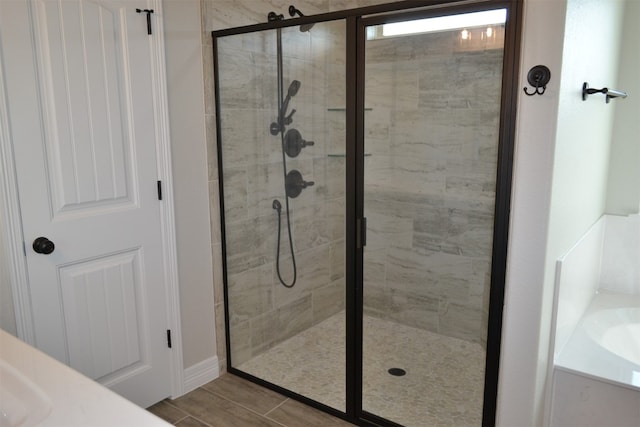 bathroom with separate shower and tub