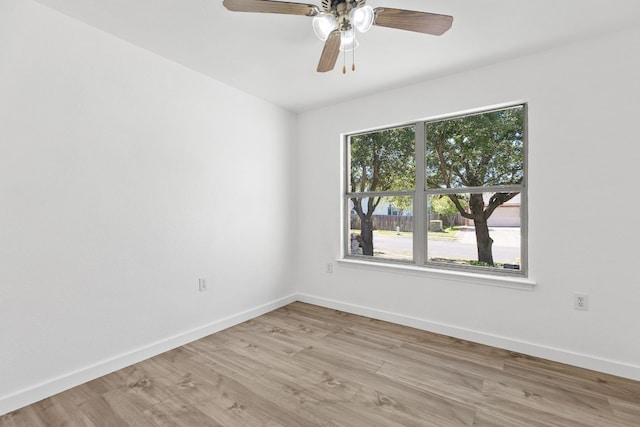 unfurnished room with ceiling fan and light hardwood / wood-style floors