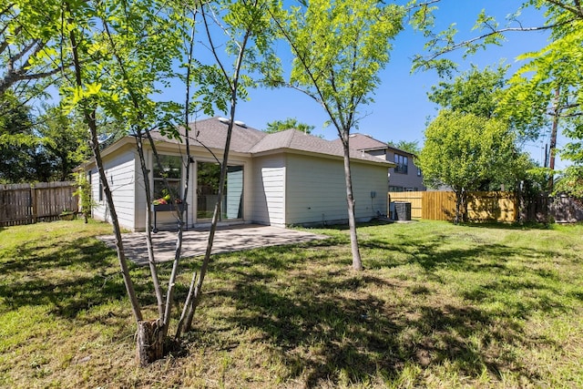 7913 Eudora Ln, Austin, TX 78747 - back of property featuring central AC and a patio