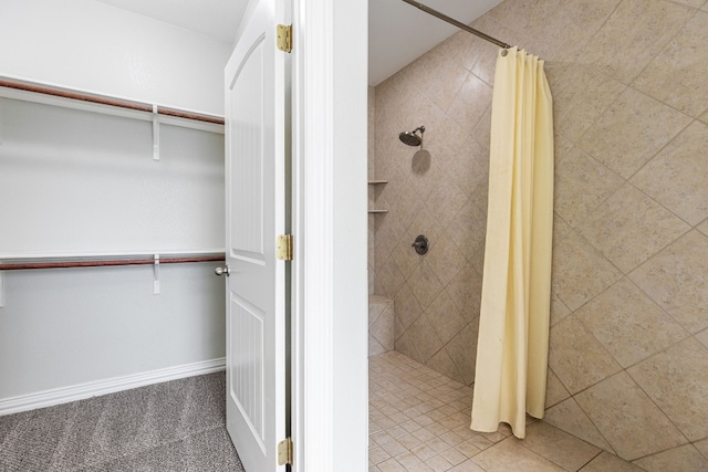 bathroom with a shower with shower curtain