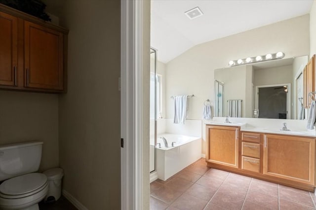 full bath with visible vents, a sink, tile patterned flooring, vaulted ceiling, and a bath