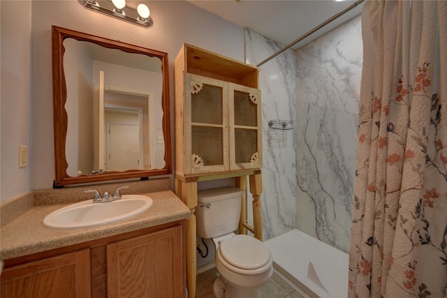 bathroom featuring tile patterned flooring, a shower with curtain, toilet, and vanity