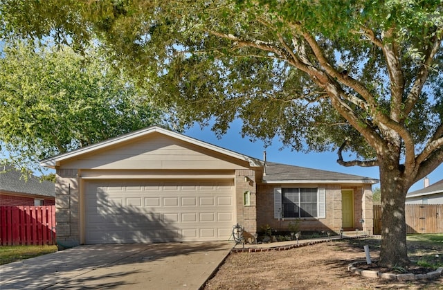 single story home with a garage