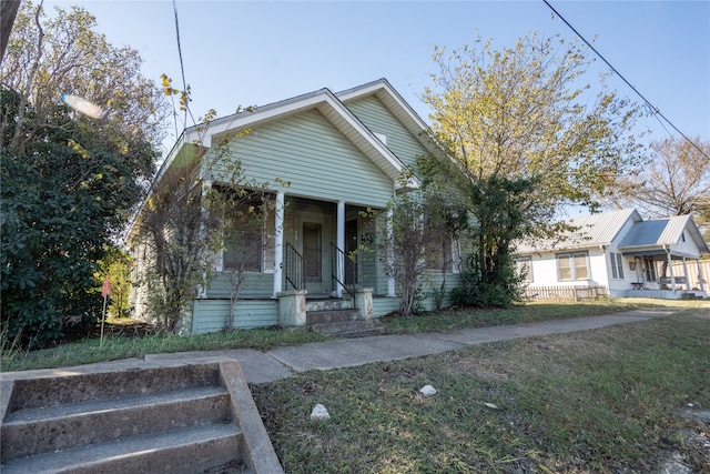 bungalow-style house featuring covered porch