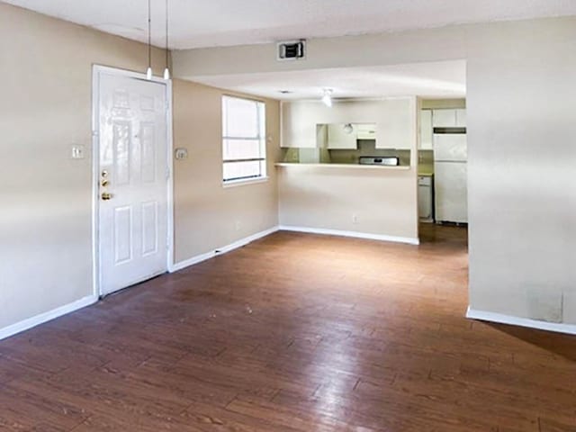 interior space featuring dark hardwood / wood-style flooring