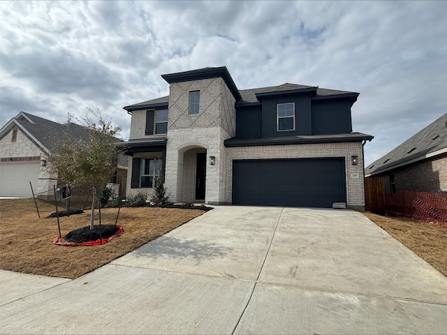 view of front of property featuring a garage